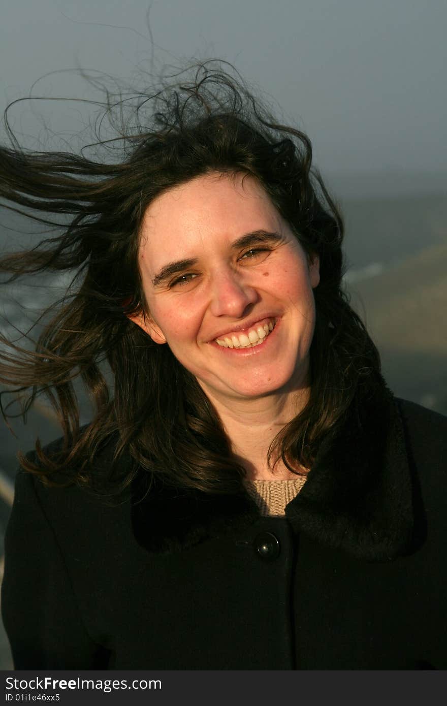 Woman withhair floating into the wind. Woman withhair floating into the wind