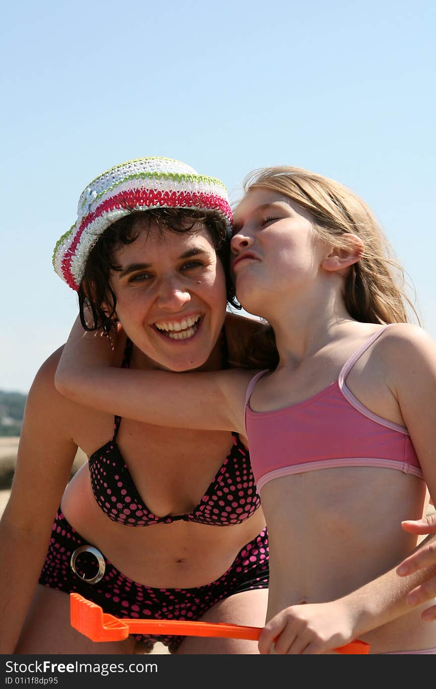 Mother and daughter at the beach