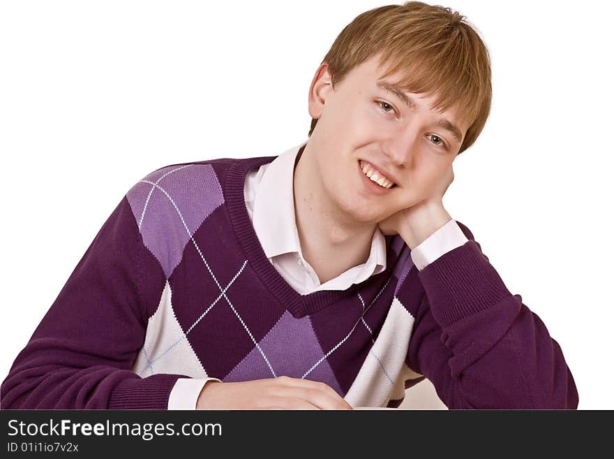 Portrait of a smiling young man sitting, isolated on white background