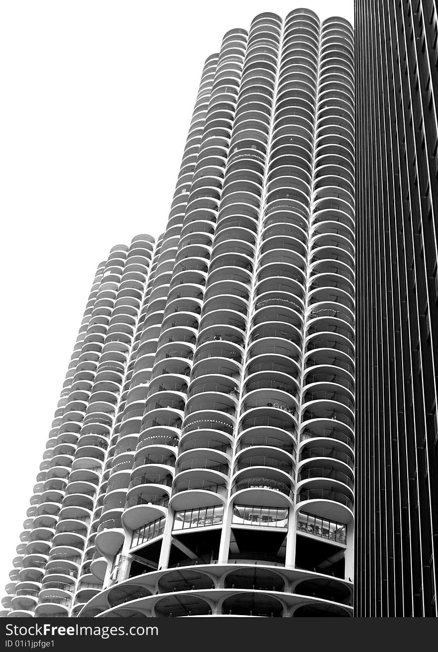 Modern skyscraper against a clear sky. Black and white image.