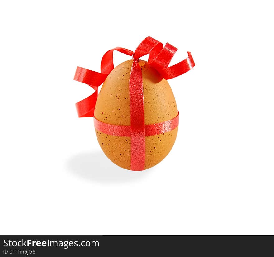 Egg With Ribbon On White.