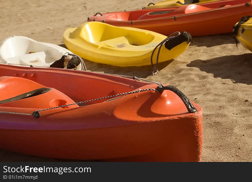 Four Canoes On Sand