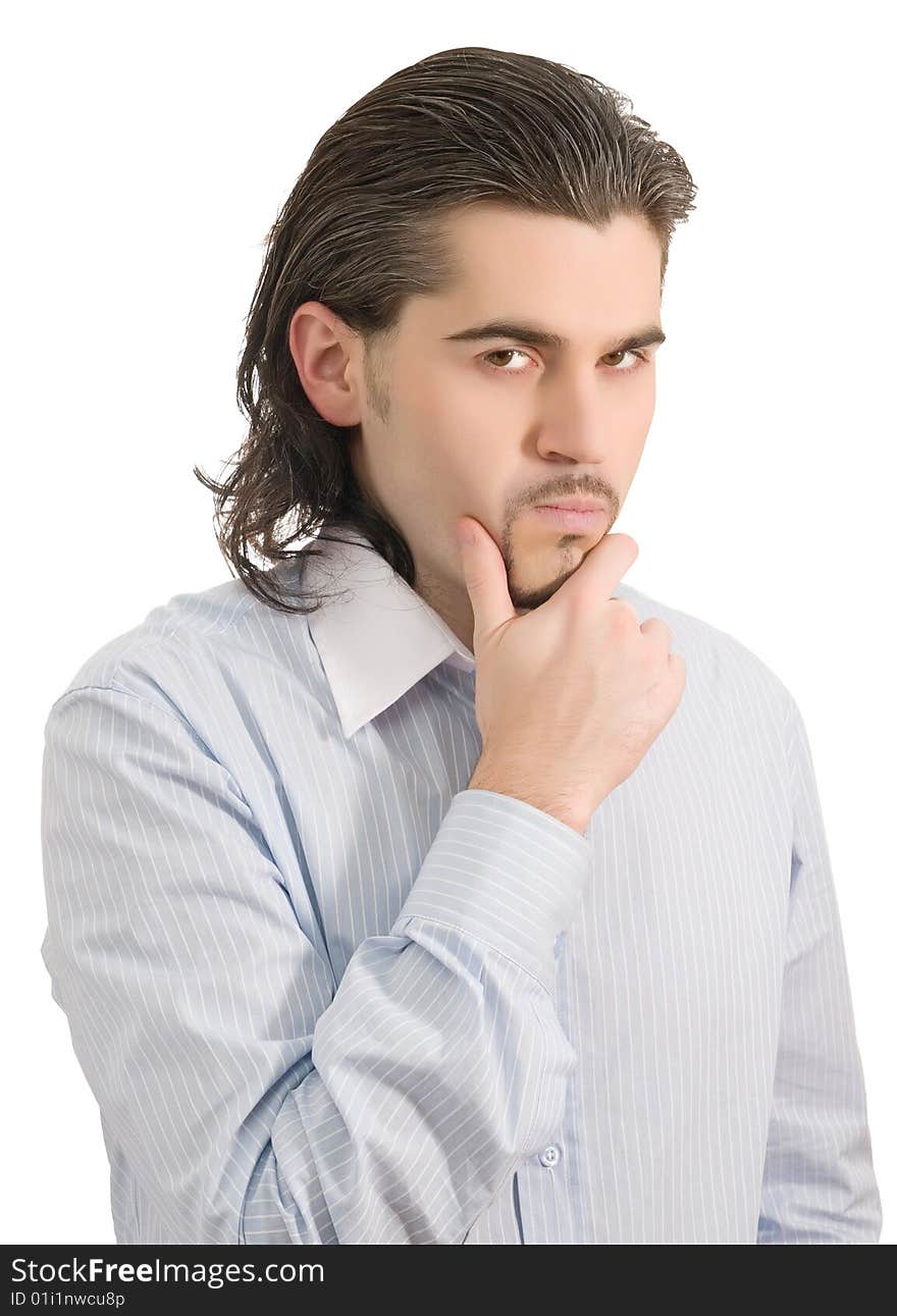 Young dark haired man in light blue striped shirt ponders over something isolated on white. Young dark haired man in light blue striped shirt ponders over something isolated on white