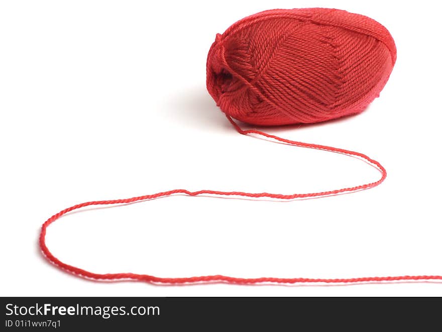 Woolen a thread for knitting red colors isolated on white