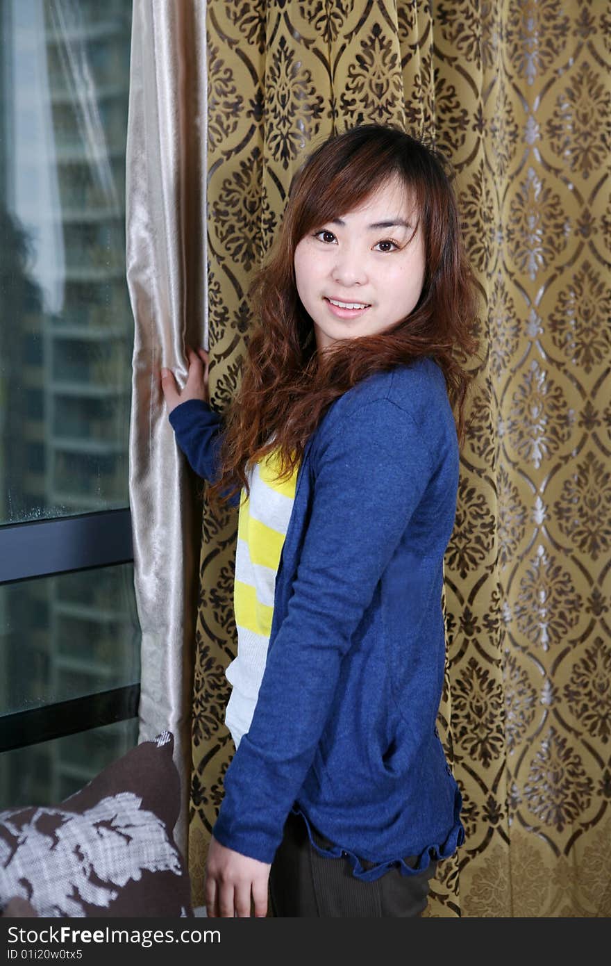 Young beautiful asia girl indoor. Young beautiful asia girl indoor