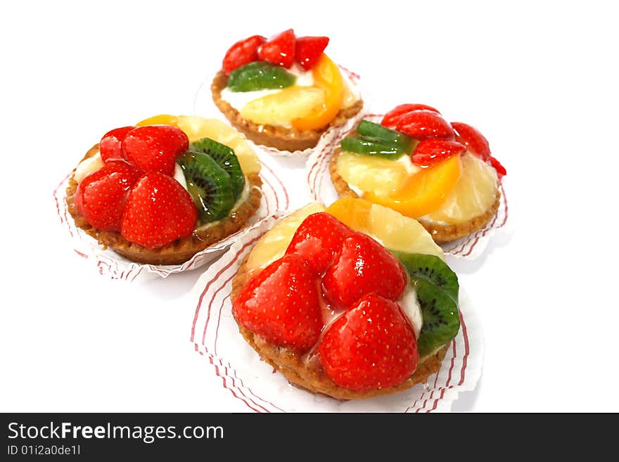 Fruit tartlets isolated  on white background. Fruit tartlets isolated  on white background.