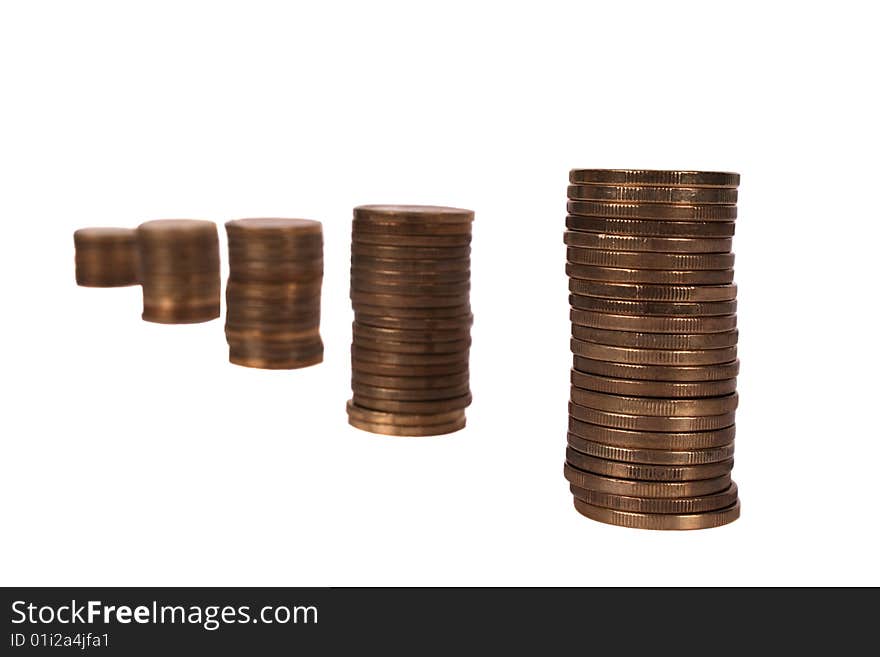 Piles of coins isolated on white background. Piles of coins isolated on white background