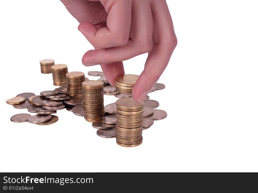 Piles of coins isolated on white background