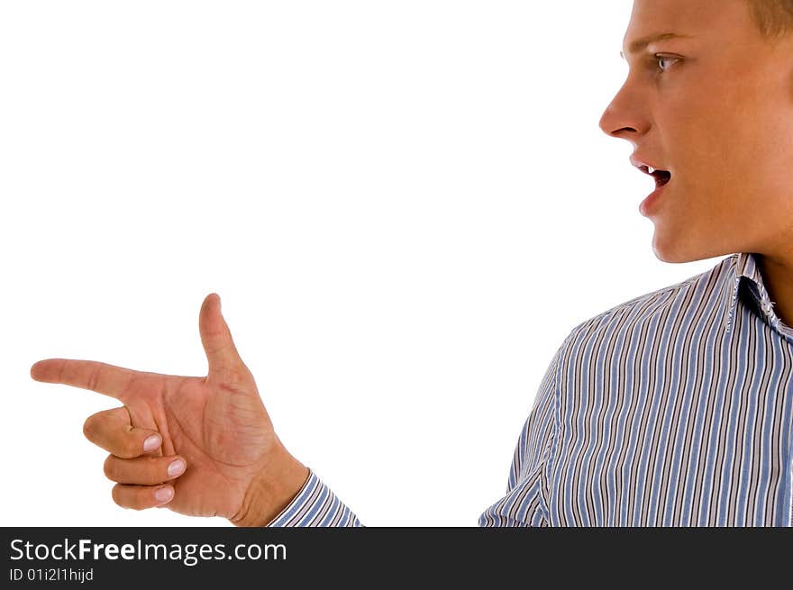 Male indicating sideways against white background