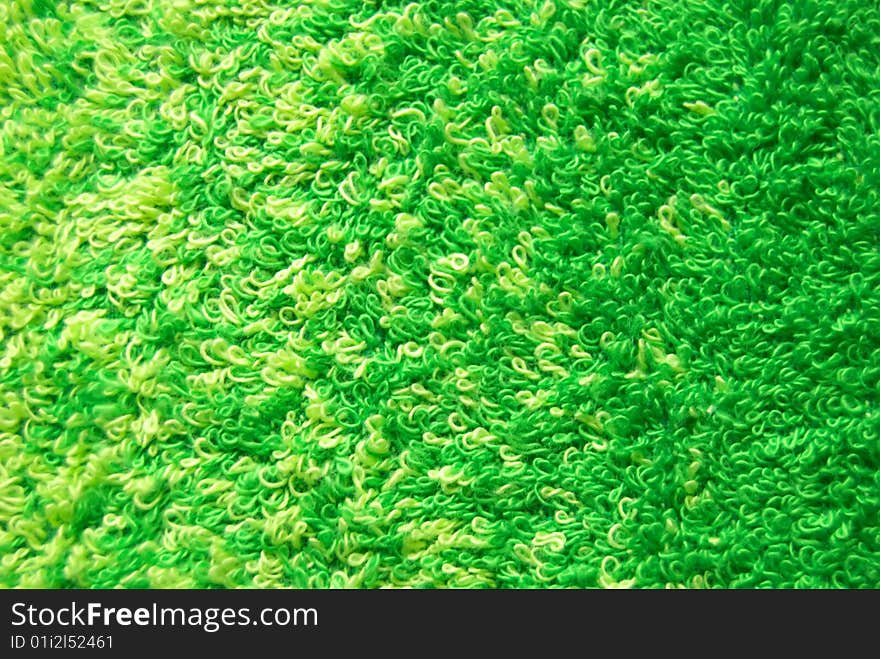 Green towel for a bath.