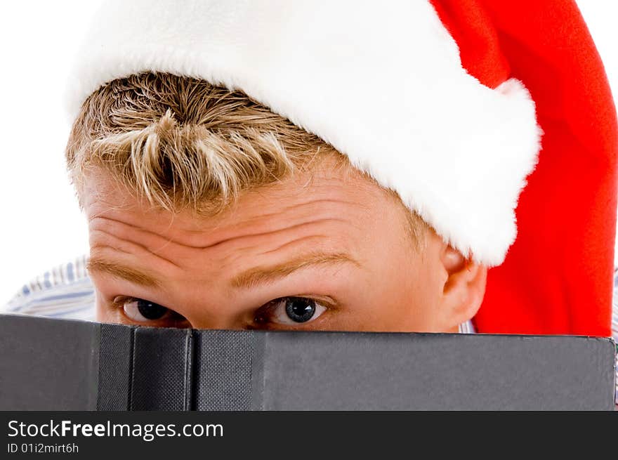 Man with book and christmas hat