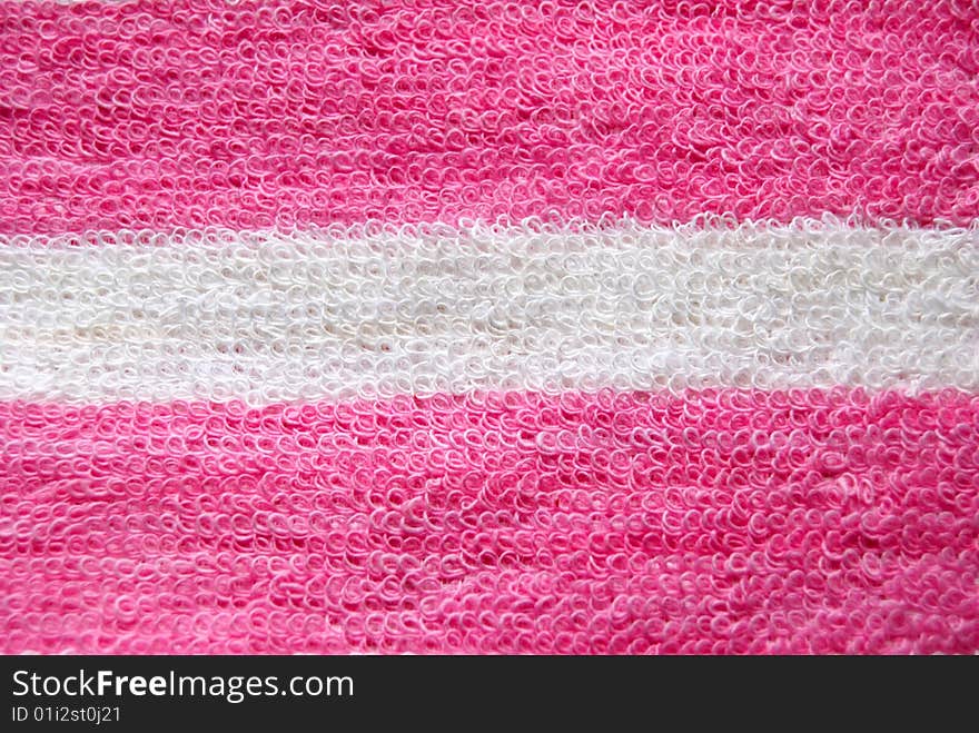 Beautiful background from a pink towel for a bath.