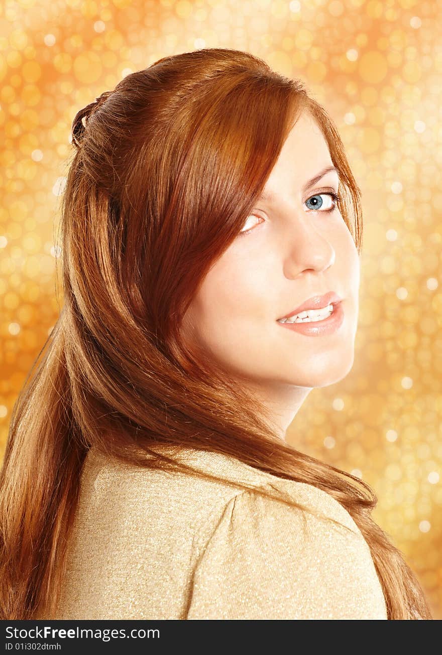 Attractive young woman over gold background. Attractive young woman over gold background