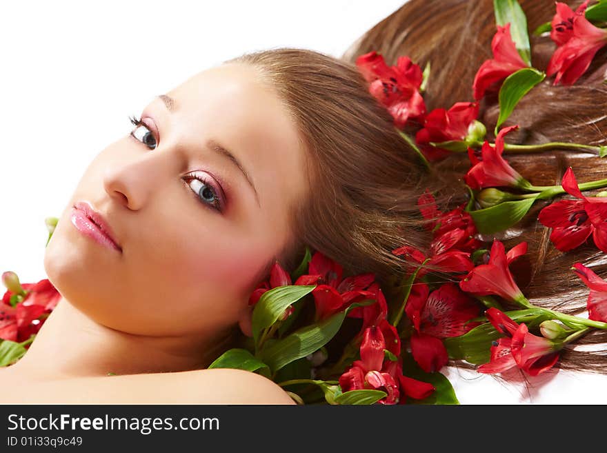 Laying beautiful  young woman with flowers. Laying beautiful  young woman with flowers