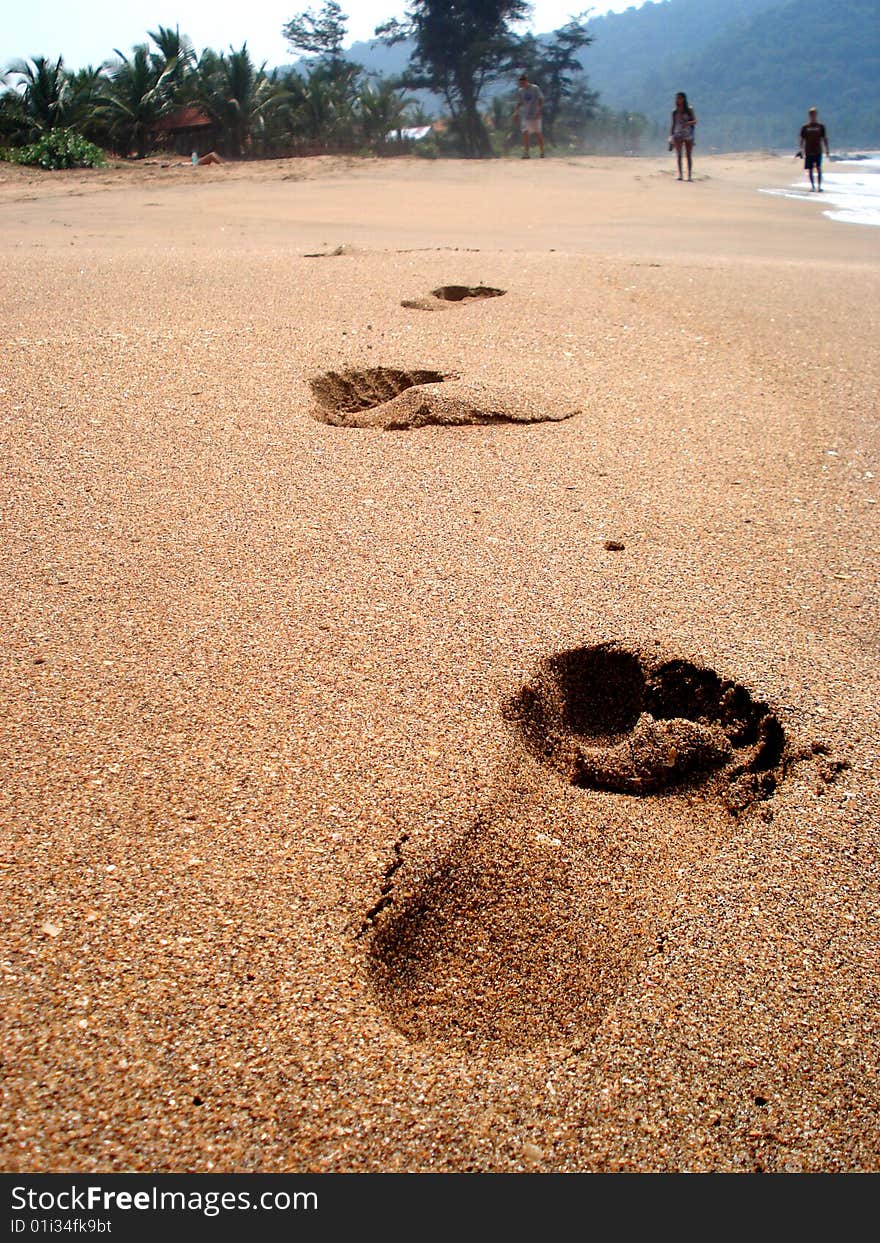 Footprints on the sandy beach