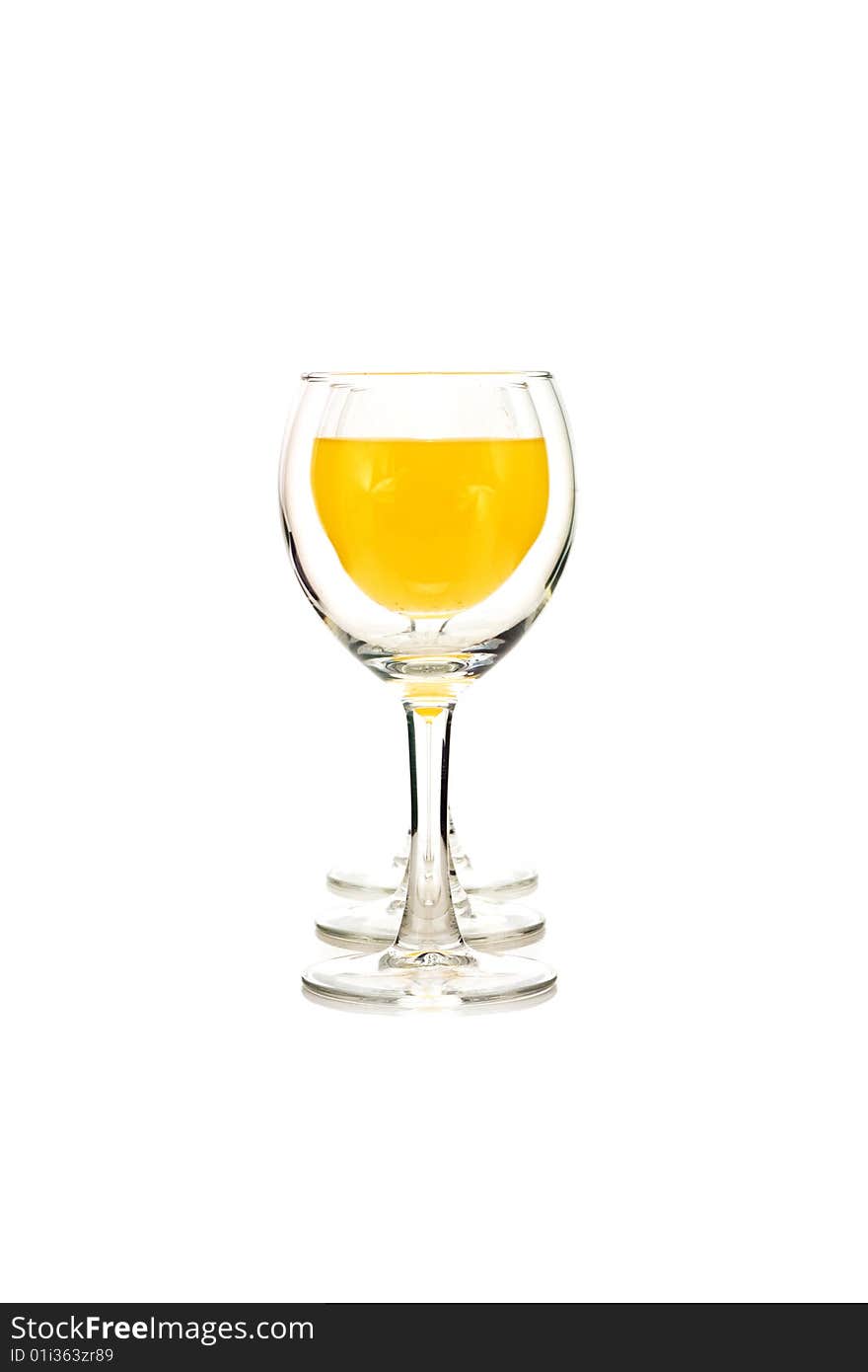 Glasses of juice on a white background