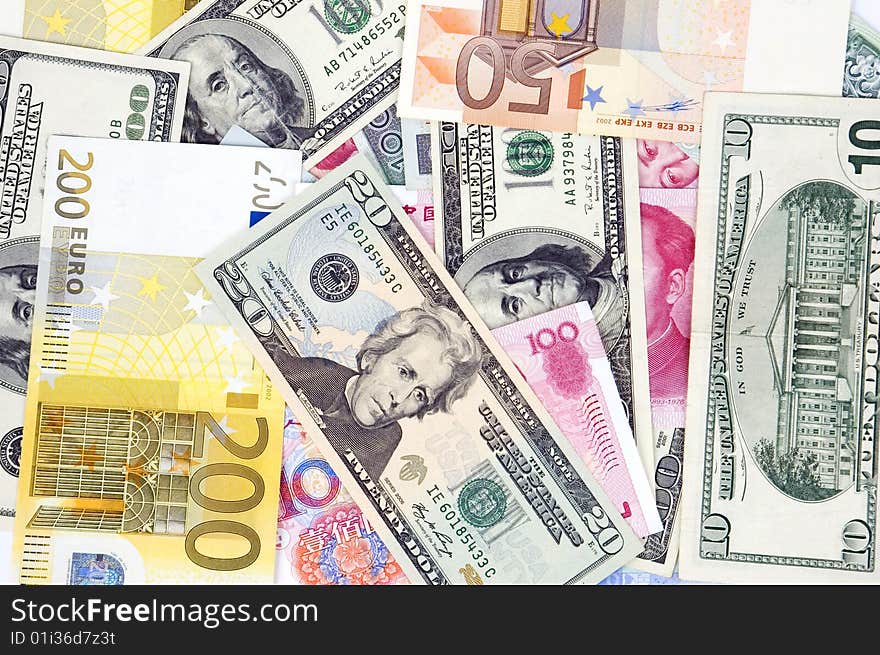 Photo of different banknotes, money in different shapes and colors. Useful for financial, economic backgrounds. Photo of different banknotes, money in different shapes and colors. Useful for financial, economic backgrounds.