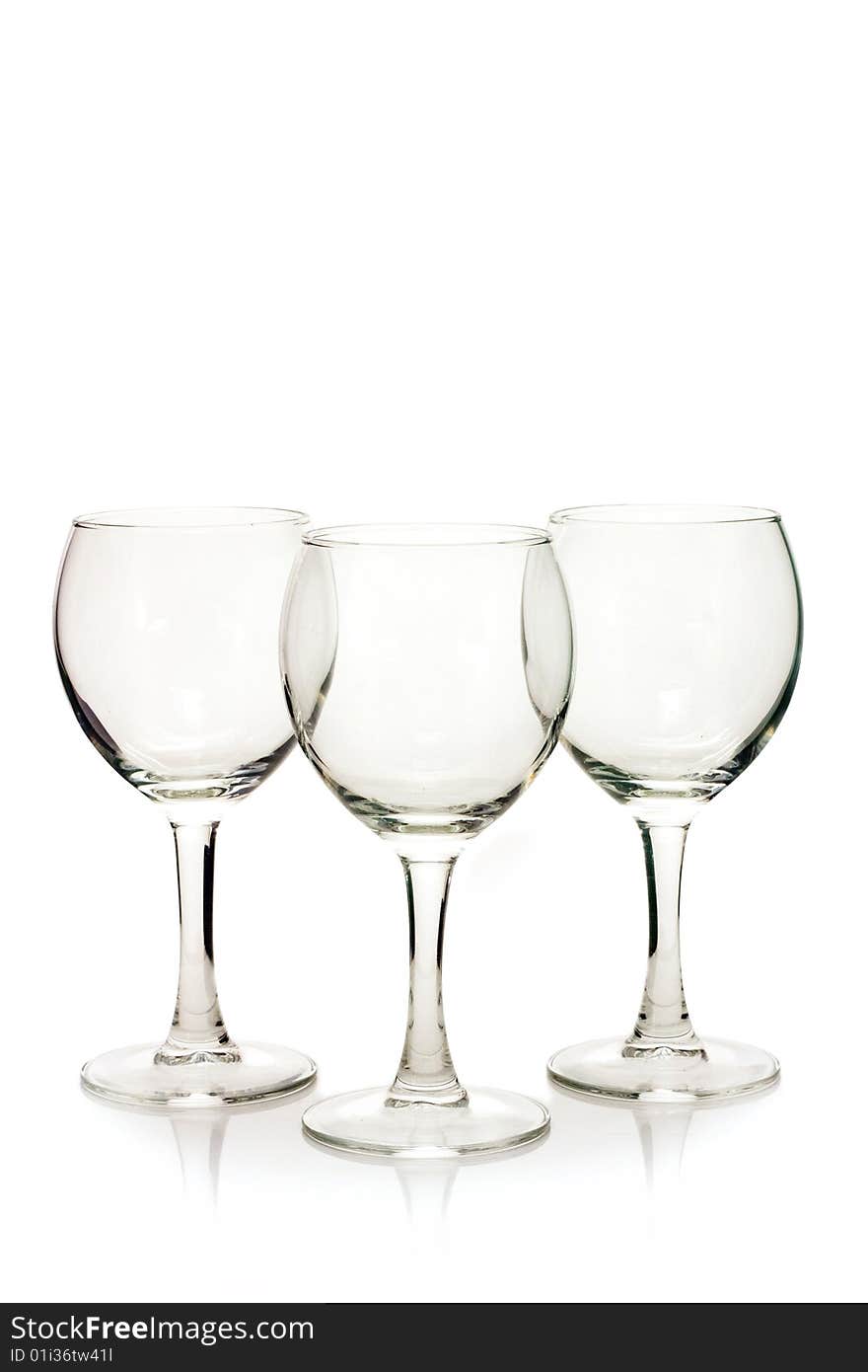 Several glass wine glasses on a white background. Several glass wine glasses on a white background