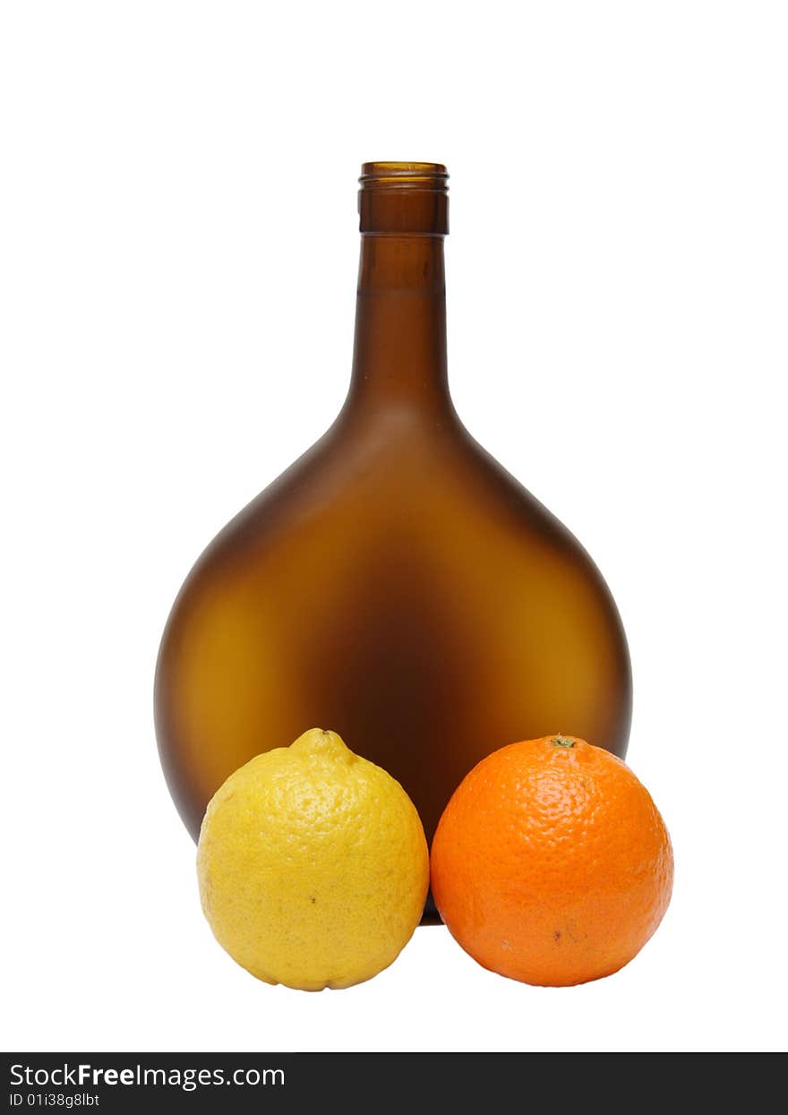 Brown bottle , lemon, apple isolated on a white background