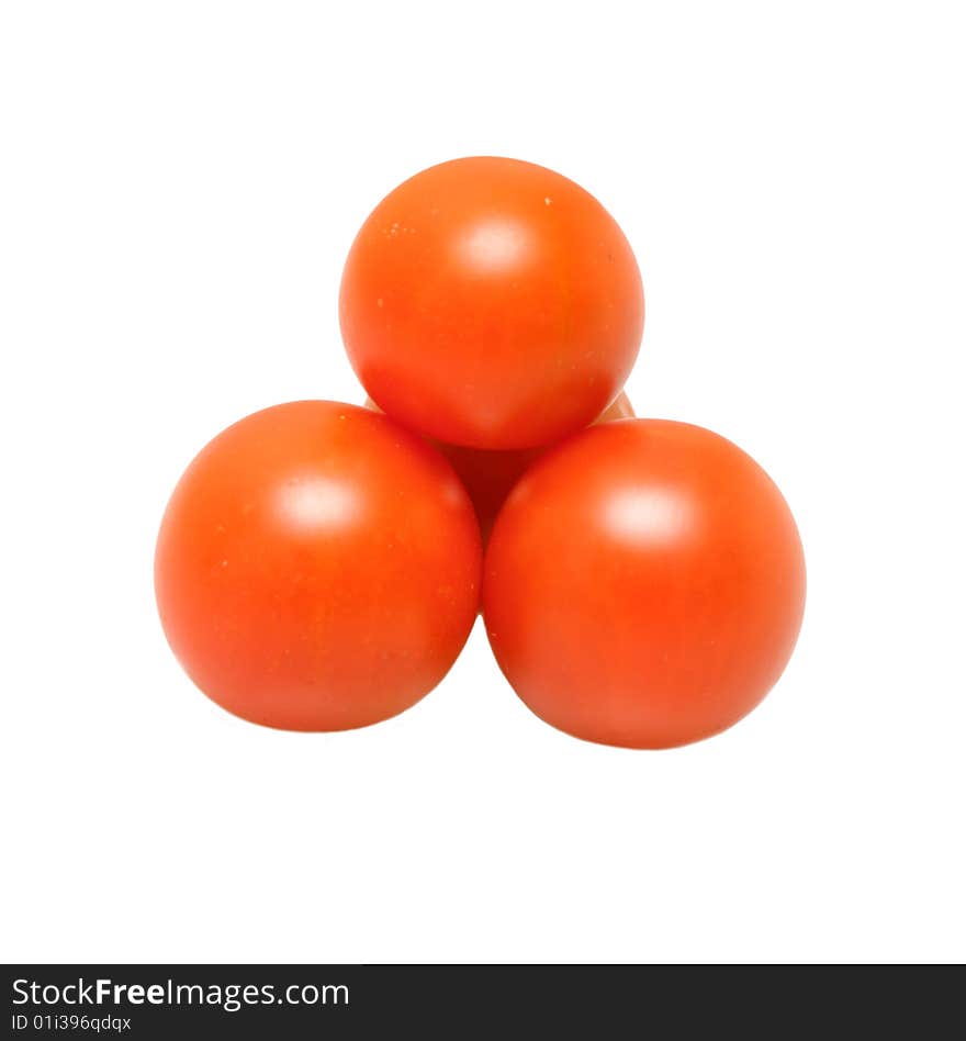 Three tomatoes isolated on a white background