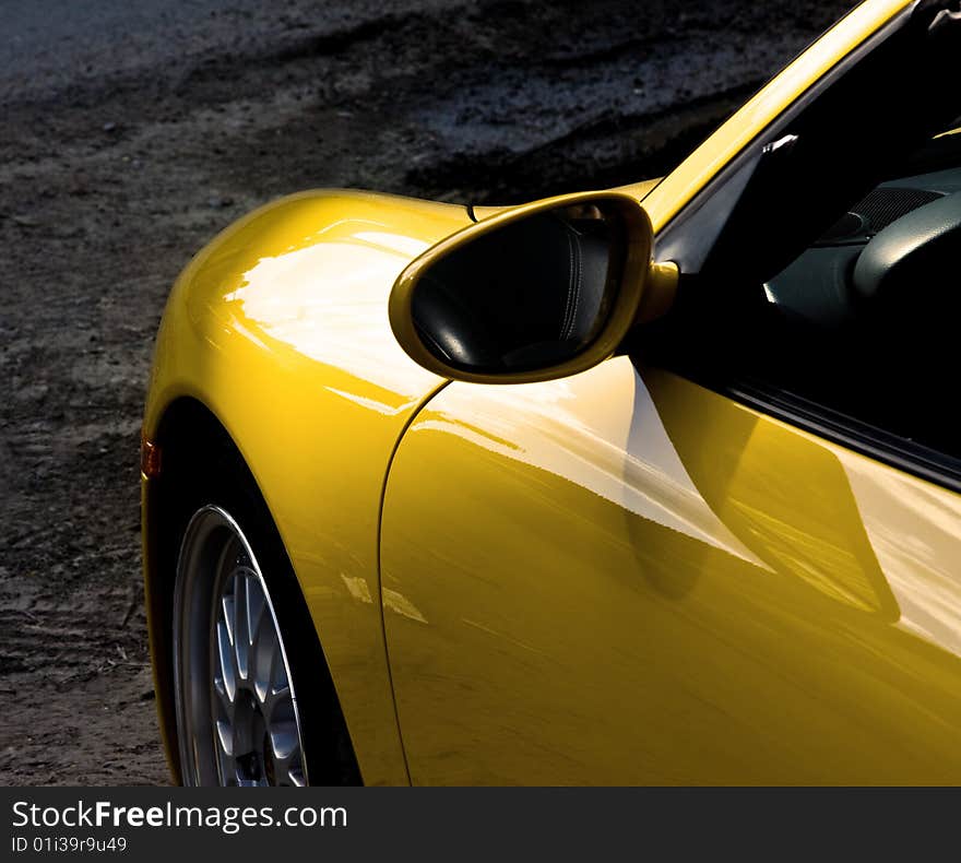 Picture of a sunny yellow car