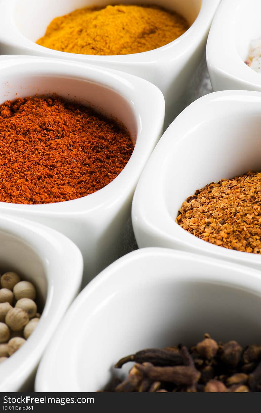 View over several pots with ground spices