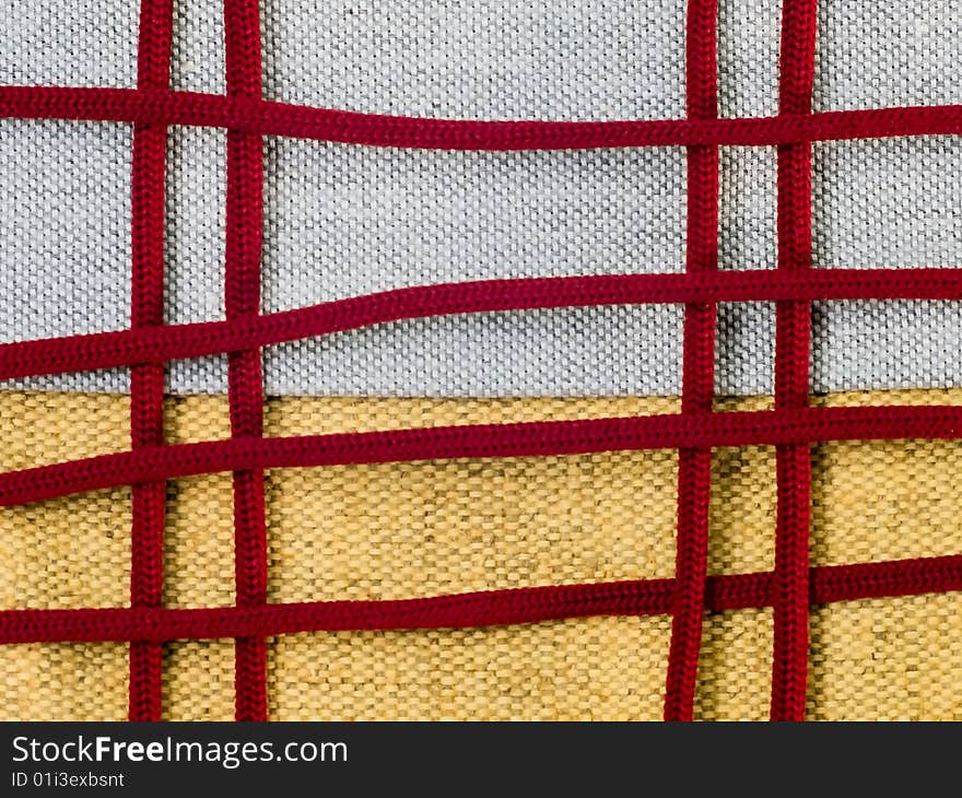 Yellow Sackcloth With Claret Laces In Macro Background