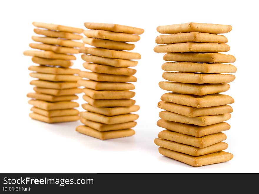 Three stacks of cookie isolated on white backgrounds