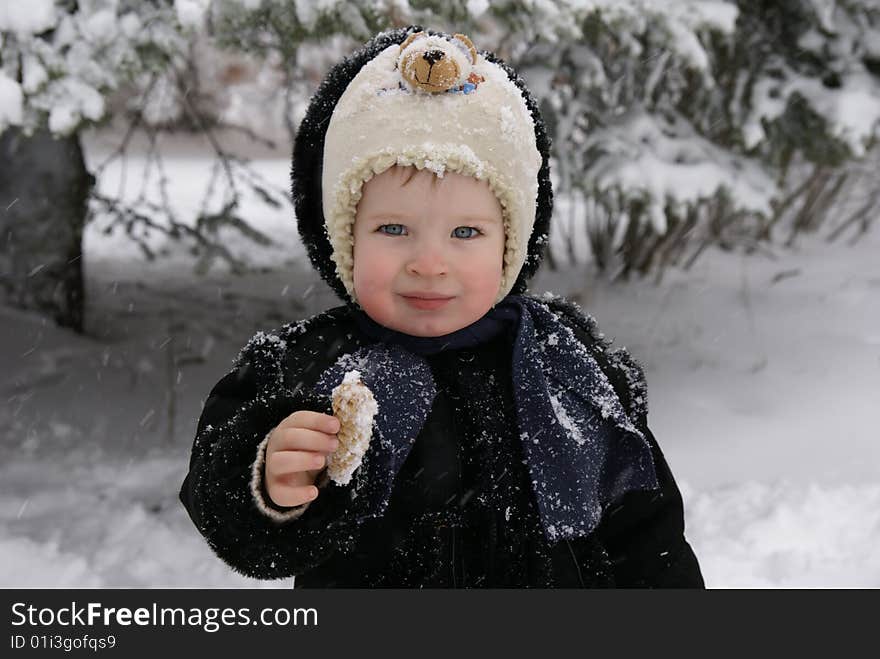 Portrait of the boy with the cone in a hand