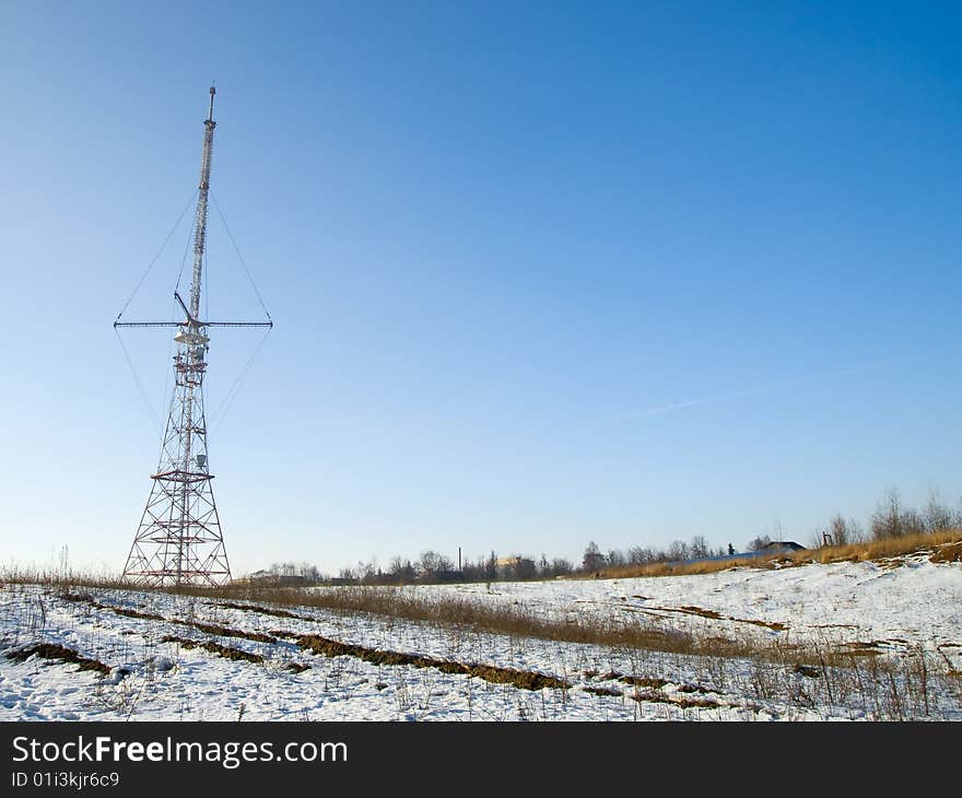 Red And White Antenna In Spring Field Horizontal. Red And White Antenna In Spring Field Horizontal