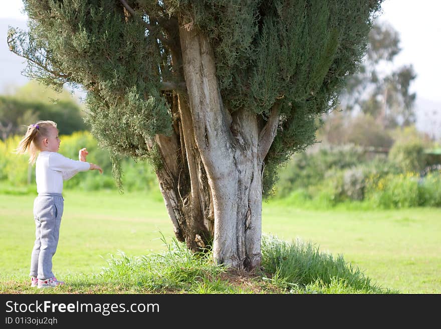 The little girl with old tree. The little girl with old tree