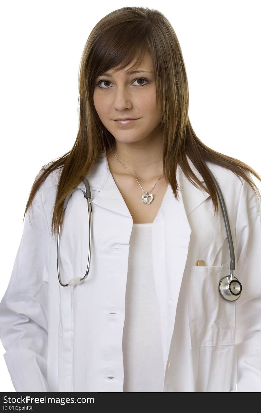 Young woman doctor with stethoscope, in a white coat against a white background