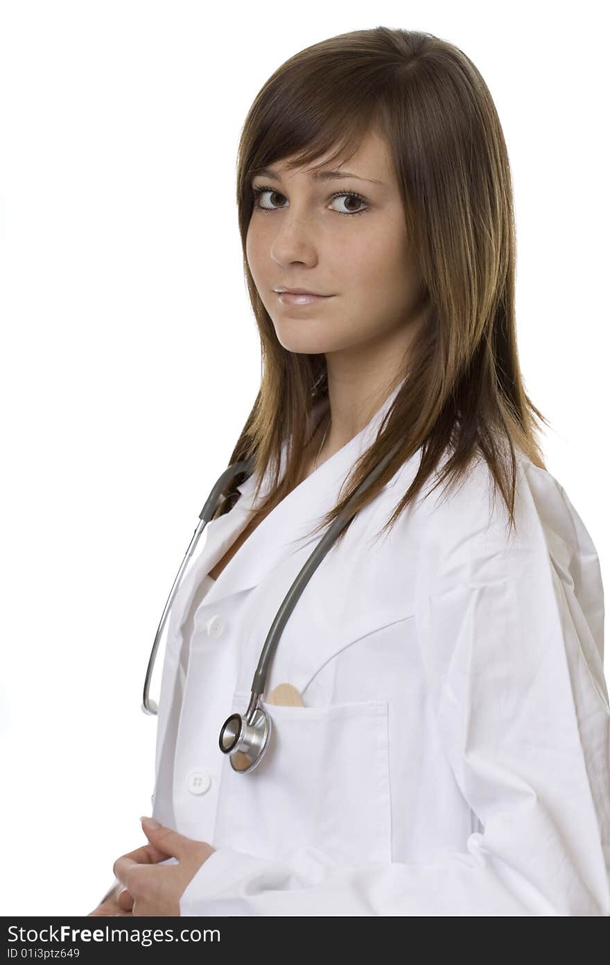 Young woman doctor with stethoscope, in a white coat against a white background