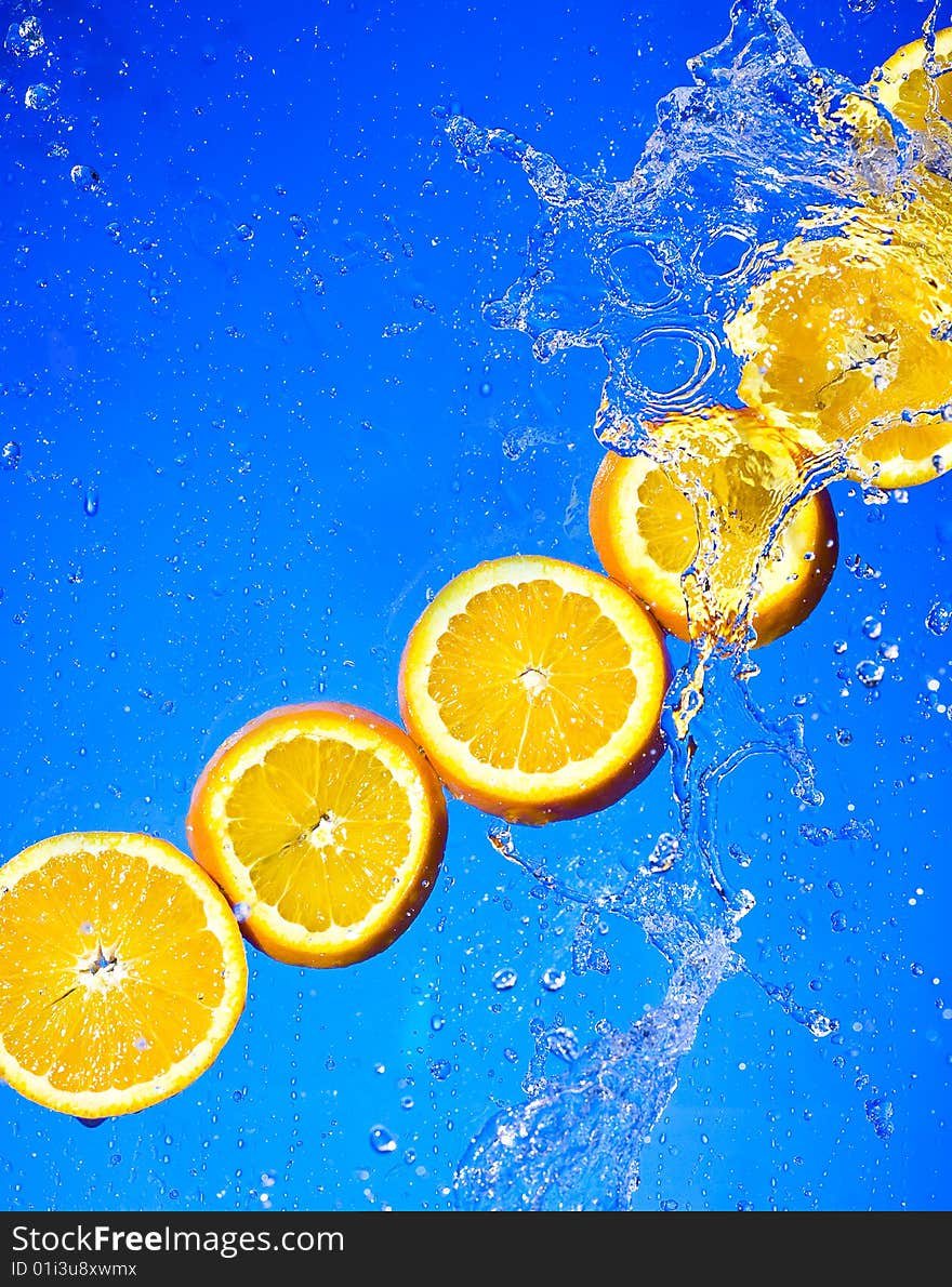 Orange with creative splashing water