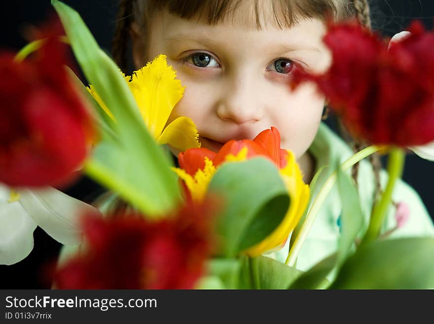 Stock photo: an image of a beautiful girl with a bouquet. Stock photo: an image of a beautiful girl with a bouquet