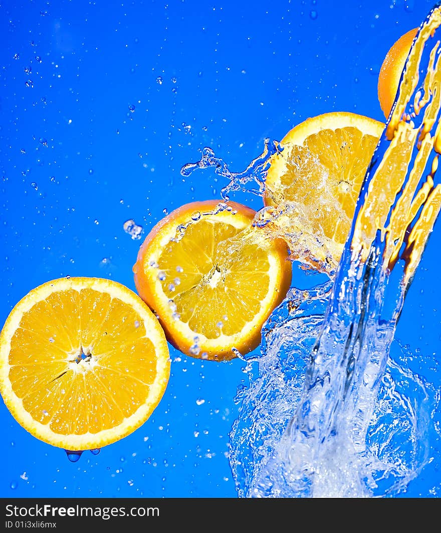 Orange with creative splashing water