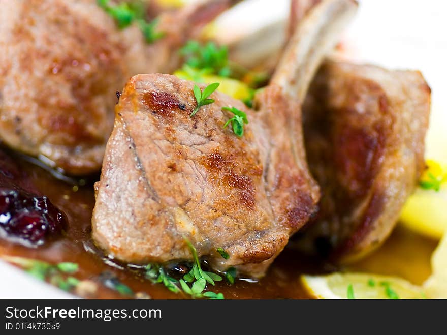 Close up picture of a roasted lamb chop-fillet- and vegetables