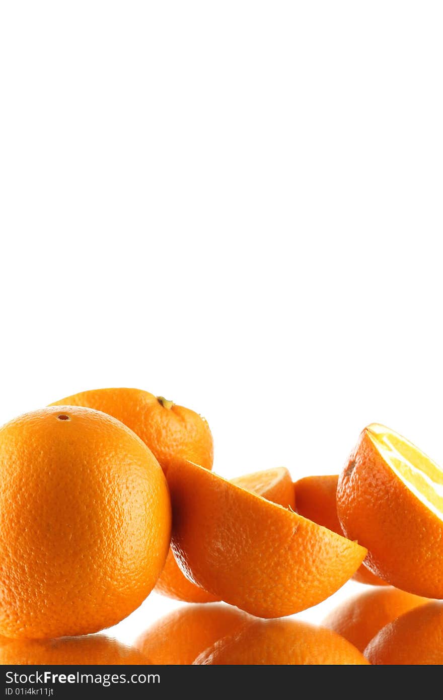 Wet ripe oranges slices isolated on white