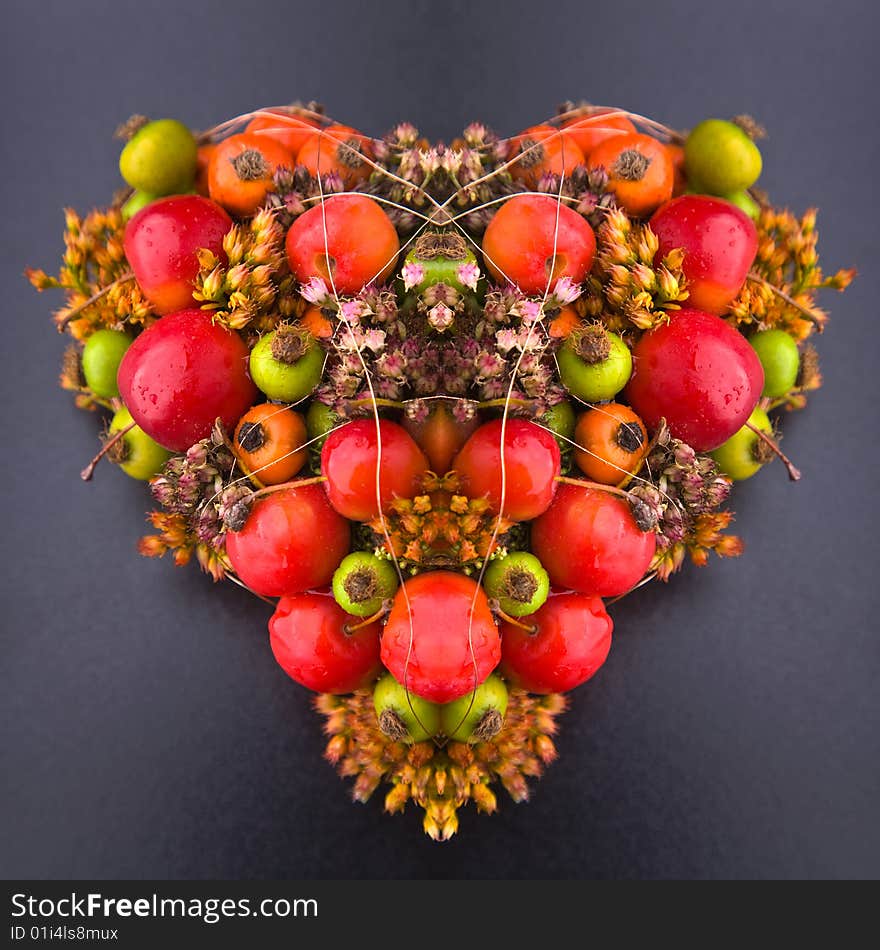 Heart-shaped flower arrangement with dried flowers