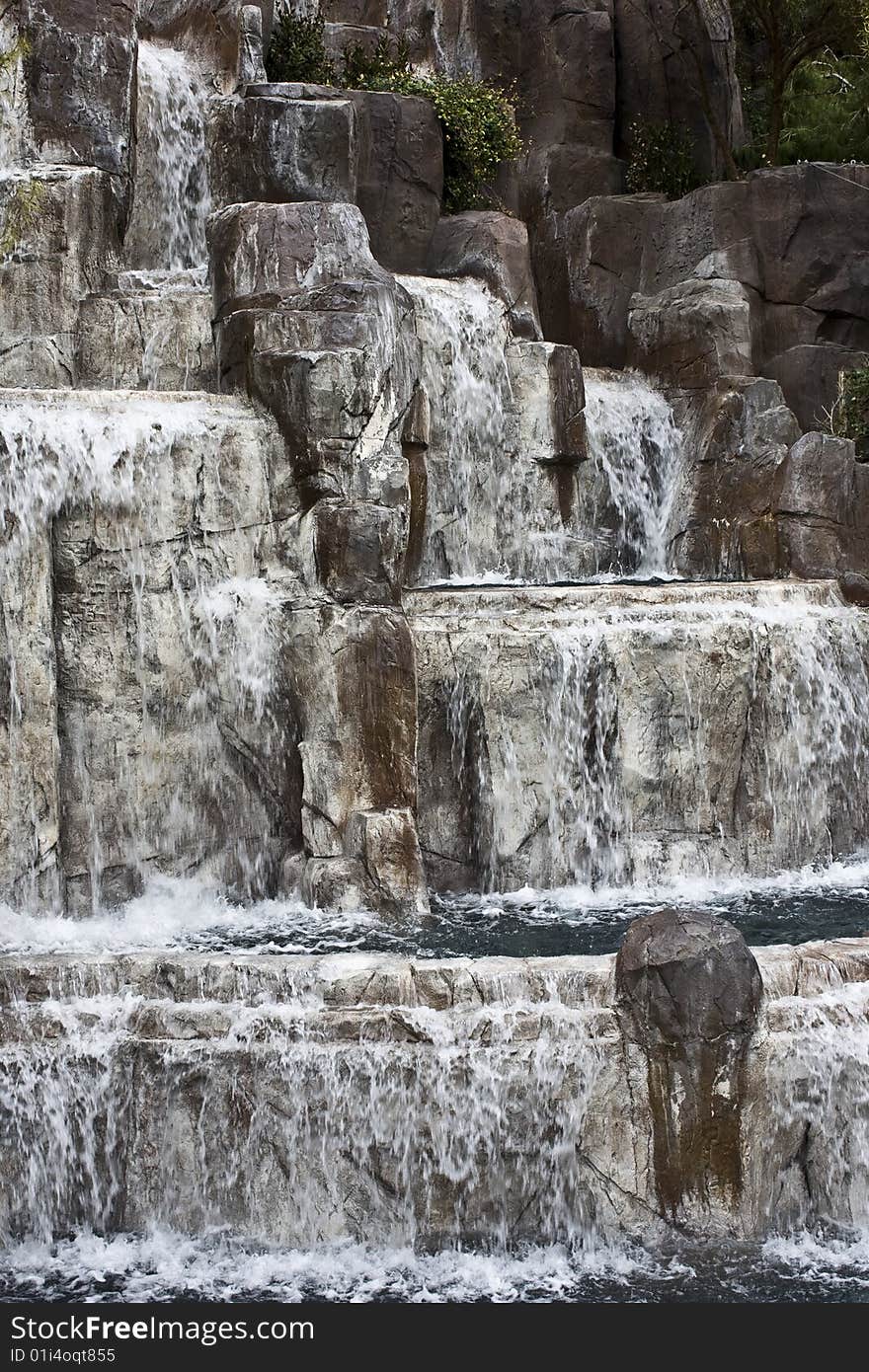 Scenic waterfall picture with rushing water over rocks