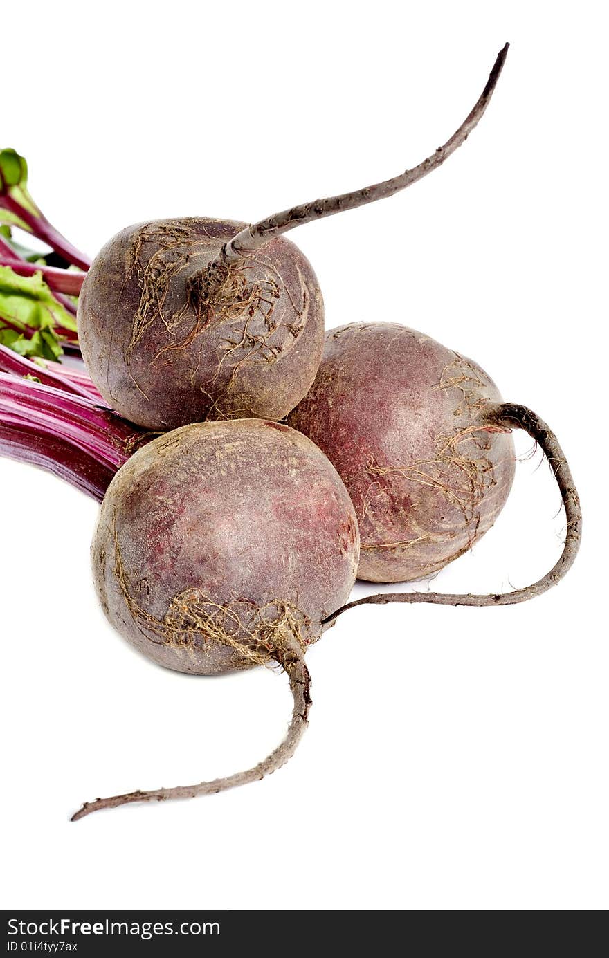 Three beet roots isolated on white.