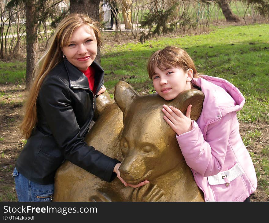 Mother and daughter near toys