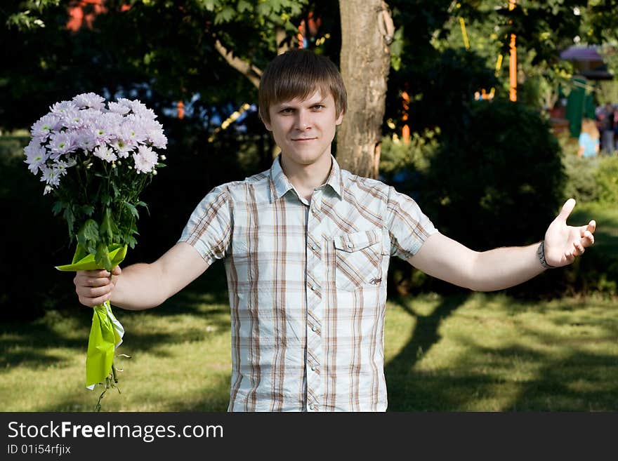 Boy presenting flowers