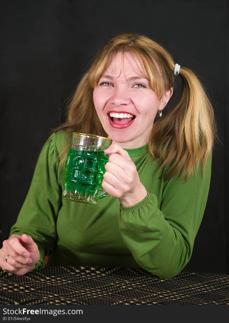 Woman keeps glass of beer