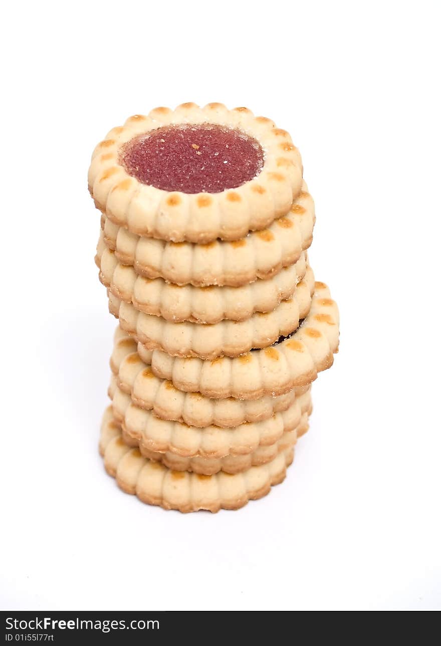 sweet biscuits filled with raspberrs 	
isolated on a white background