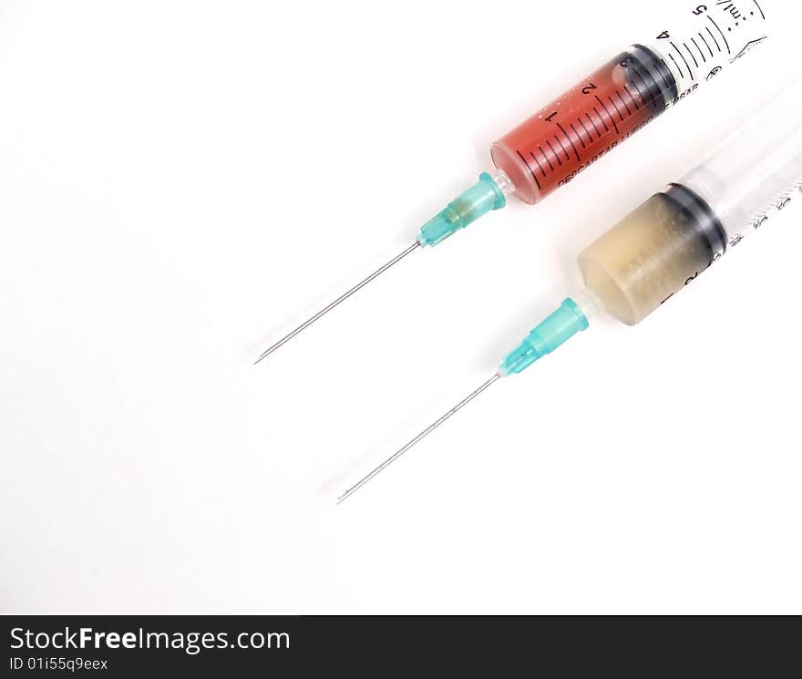 Syringes 	
isolated on a white background