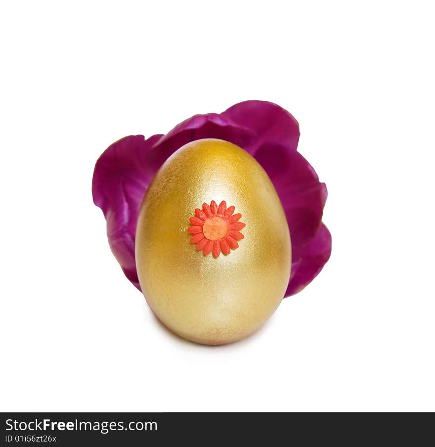 Easter golden egg inside a tulip flower