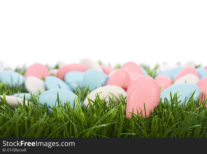 Easter almonds candy on green grass