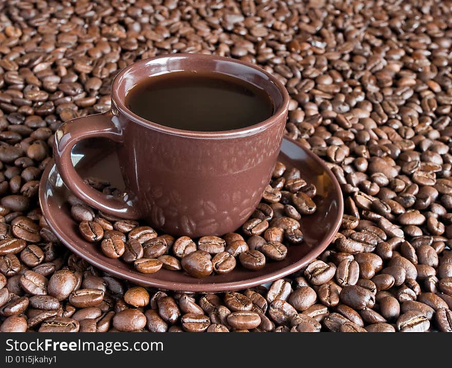 Coffee cup and beans