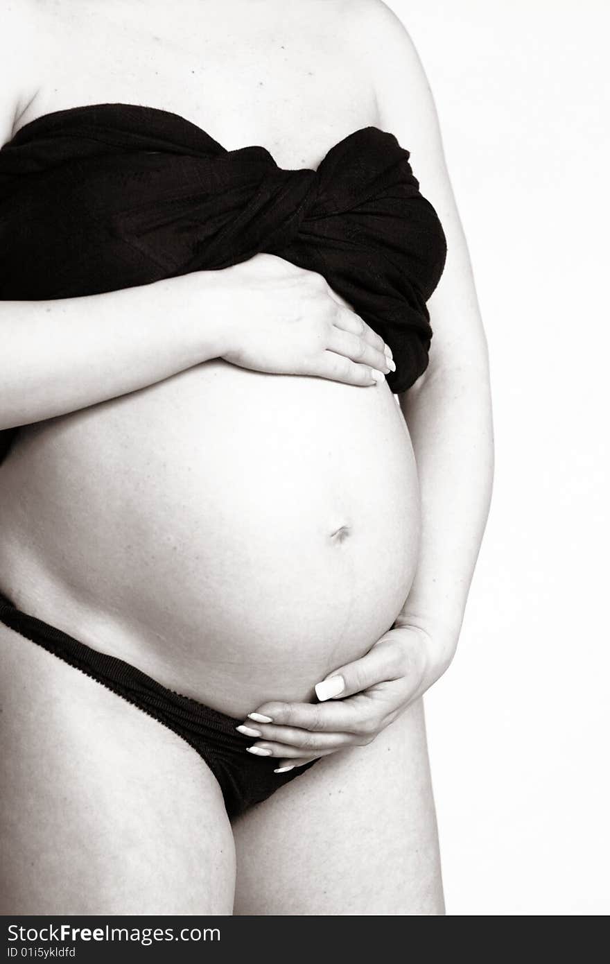 The photo of a pregnant woman in black and white